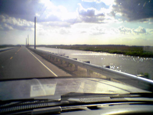 View leaving Woodland Beach of canals on both sides of the road.